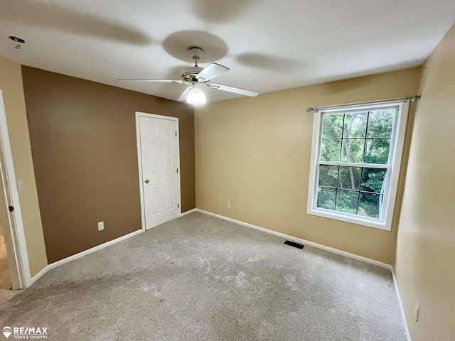 1421 Newcastle Dr, Davison, MI 48423 - empty room featuring ceiling fan and carpet floors
