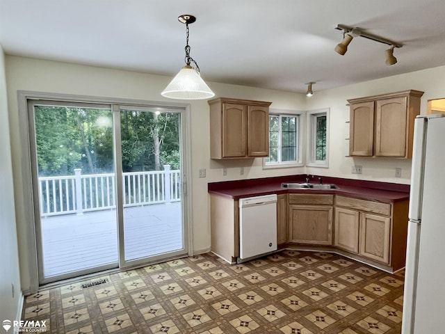 1421 Newcastle Dr, Davison, MI 48423 - kitchen featuring white appliances, dark countertops, hanging light fixtures, and light flooring