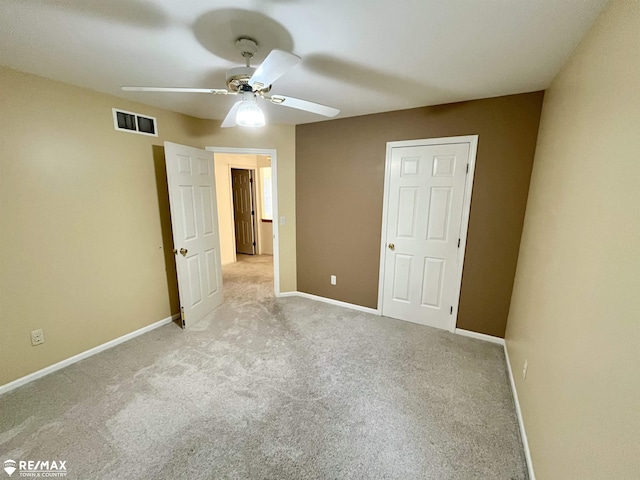 1421 Newcastle Dr, Davison, MI 48423 - unfurnished bedroom featuring carpet and a ceiling fan
