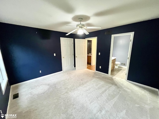 1421 Newcastle Dr, Davison, MI 48423 - unfurnished bedroom featuring ensuite bath, carpet, and ceiling fan