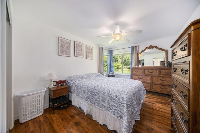 119 Burt Ave, Jackson, MI 49201 - bedroom with dark wood-style flooring and a ceiling fan