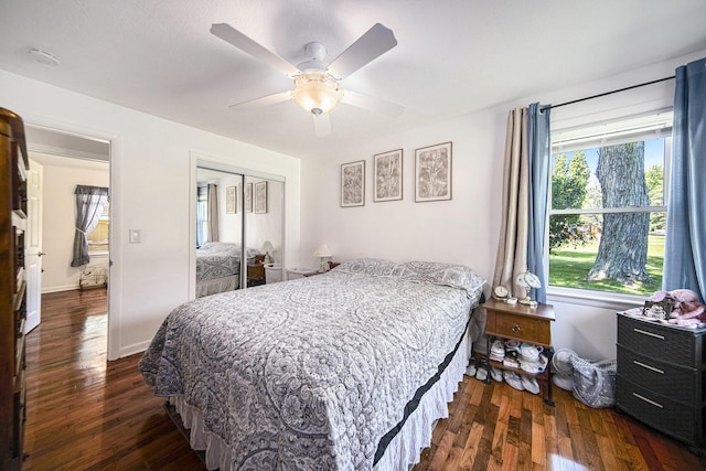 119 Burt Ave, Jackson, MI 49201 - bedroom with dark wood-style flooring, a closet, and a ceiling fan