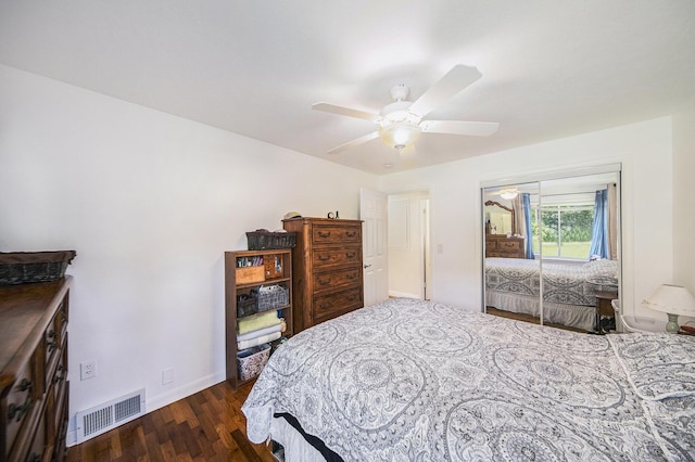 119 Burt Ave, Jackson, MI 49201 - bedroom with dark wood-style flooring and ceiling fan