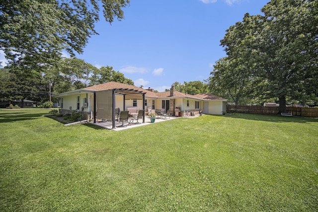 119 Burt Ave, Jackson, MI 49201 - back of house featuring a pergola, a patio, and a chimney