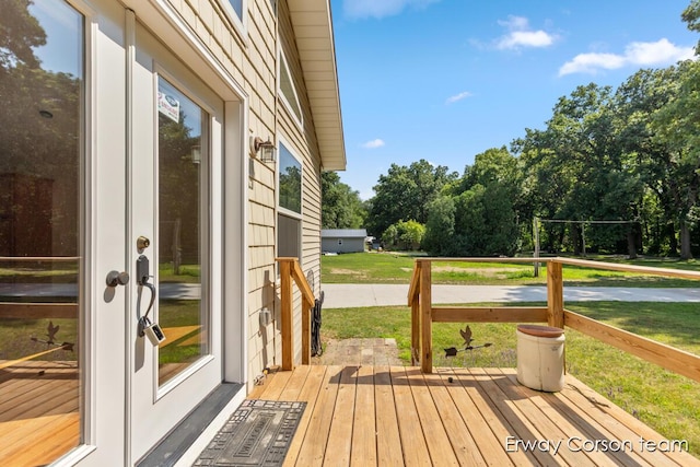 5599 Marsh Rd, Shelbyville, MI 49344 - deck with a lawn, french doors, and view of wooded area