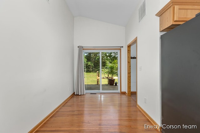 5599 Marsh Rd, Shelbyville, MI 49344 - unfurnished room featuring light wood finished floors and high vaulted ceiling