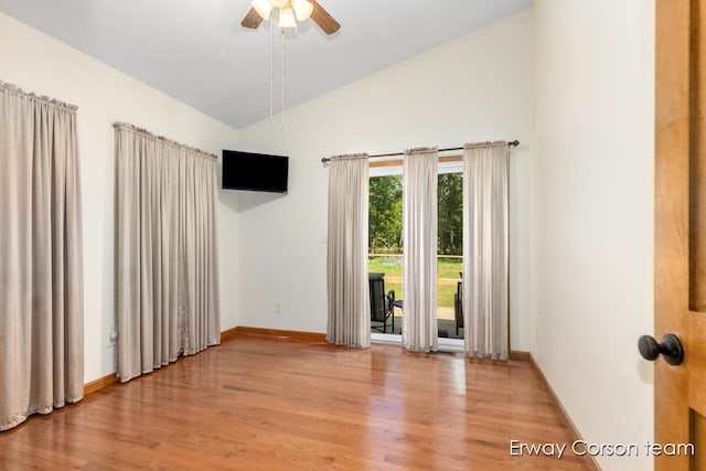5599 Marsh Rd, Shelbyville, MI 49344 - empty room featuring wood finished floors, a ceiling fan, and high vaulted ceiling