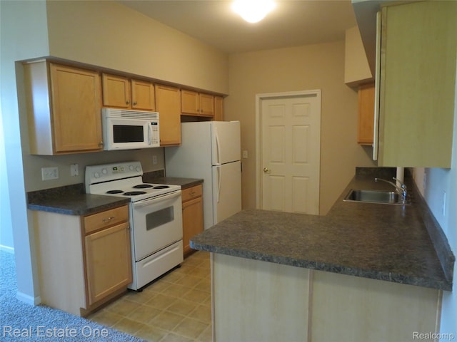 3153 Kneeland Cir, Howell, MI 48843 - kitchen with white appliances, a peninsula, and dark countertops