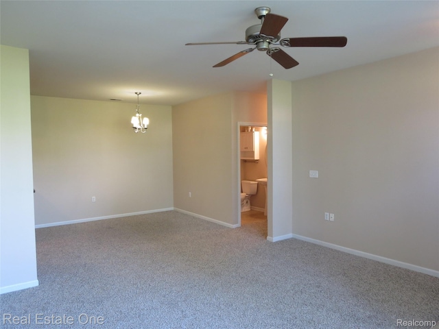 3153 Kneeland Cir, Howell, MI 48843 - carpeted spare room featuring a chandelier and ceiling fan