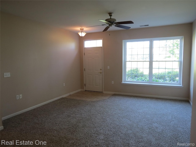 3153 Kneeland Cir, Howell, MI 48843 - empty room featuring a ceiling fan and carpet floors