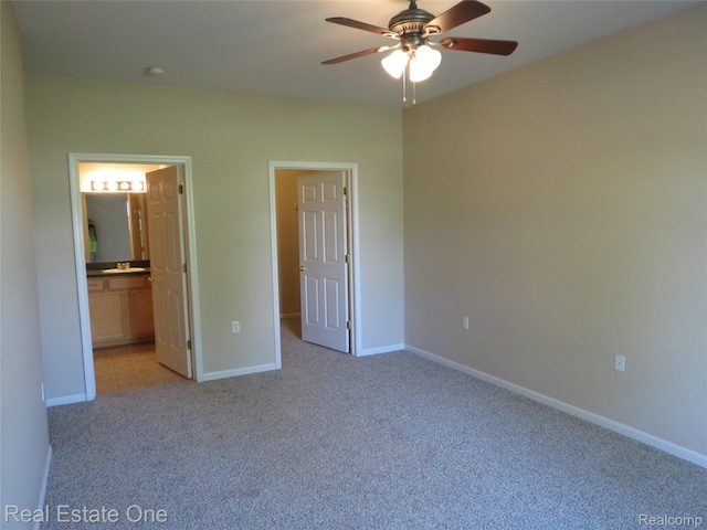 3153 Kneeland Cir, Howell, MI 48843 - unfurnished bedroom featuring light carpet, connected bathroom, and ceiling fan