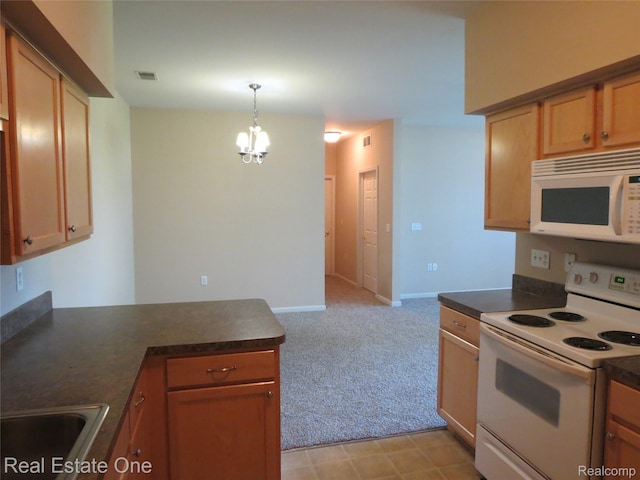 3153 Kneeland Cir, Howell, MI 48843 - kitchen featuring white appliances, a chandelier, dark countertops, light colored carpet, and a peninsula