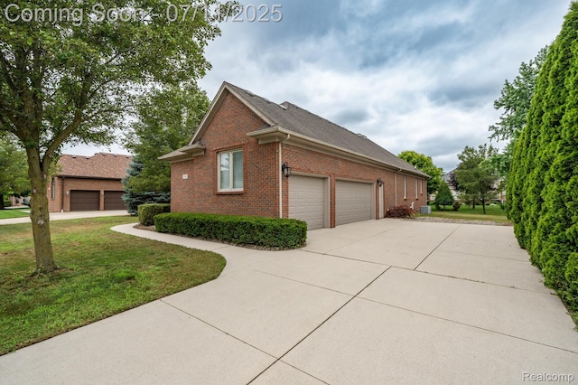 13823 Blue Beech Ln, Shelby Twp, MI 48315 - view of home's exterior with brick siding, concrete driveway, and a lawn