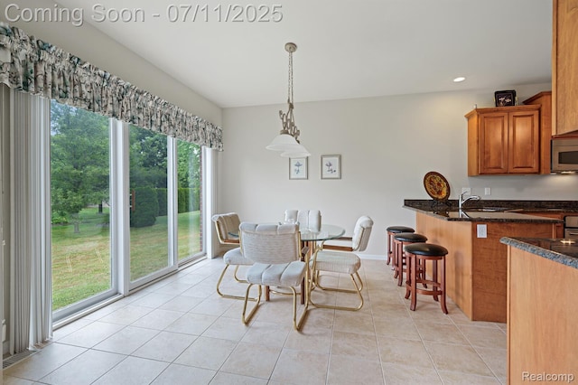 13823 Blue Beech Ln, Shelby Twp, MI 48315 - dining space featuring light tile patterned flooring and recessed lighting