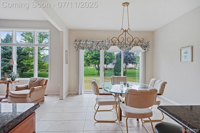 13823 Blue Beech Ln, Shelby Twp, MI 48315 - dining space featuring healthy amount of natural light and light tile patterned floors