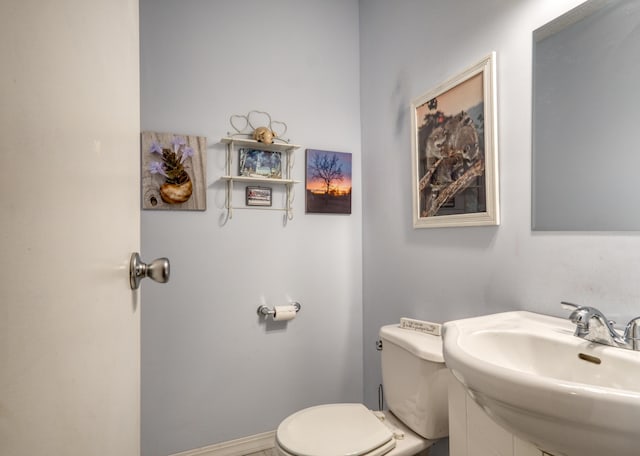 13113 Pinewood St NE, Gowen, MI 49326 - bathroom with toilet and a sink