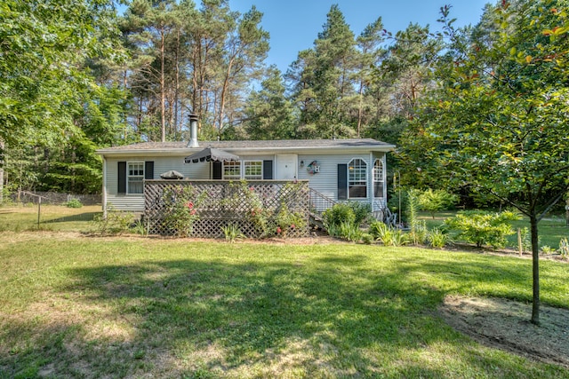 13113 Pinewood St NE, Gowen, MI 49326 - view of front facade featuring a deck