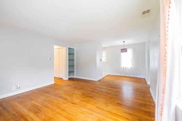 8876 Sheldon Rd, Plymouth, MI 48170 - spare room featuring light wood finished floors