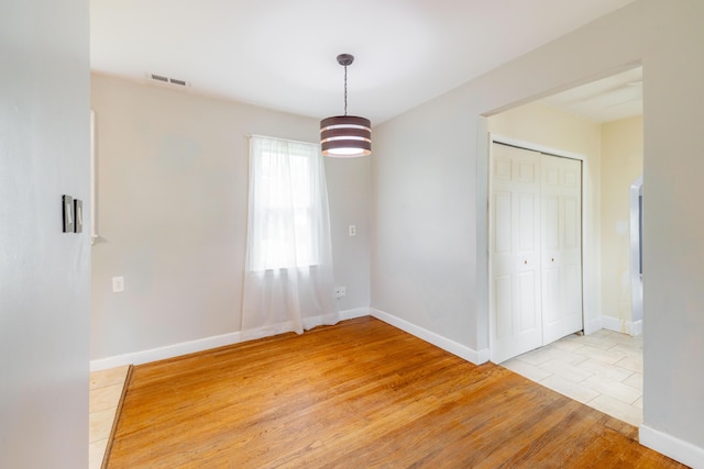 8876 Sheldon Rd, Plymouth, MI 48170 - empty room featuring light wood-type flooring and baseboards