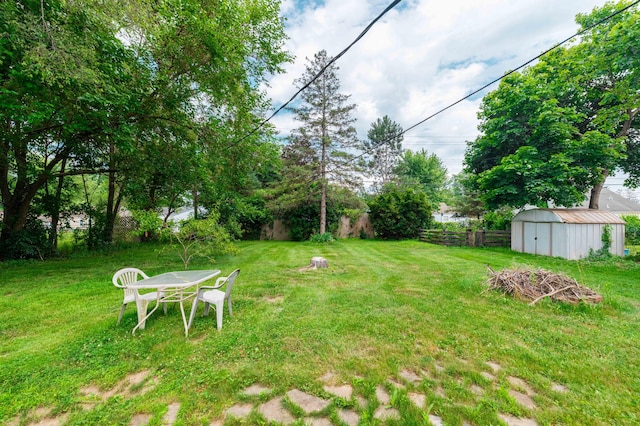 8876 Sheldon Rd, Plymouth, MI 48170 - view of yard featuring a storage shed