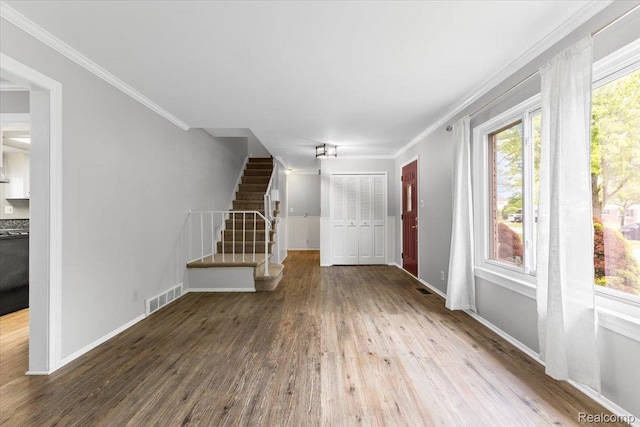 12360 Moers Dr, Sterling Heights, MI 48313 - entryway featuring ornamental molding, wood finished floors, and stairs