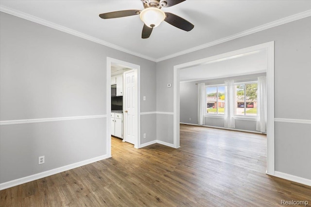 12360 Moers Dr, Sterling Heights, MI 48313 - unfurnished room with wood finished floors, ornamental molding, and a ceiling fan