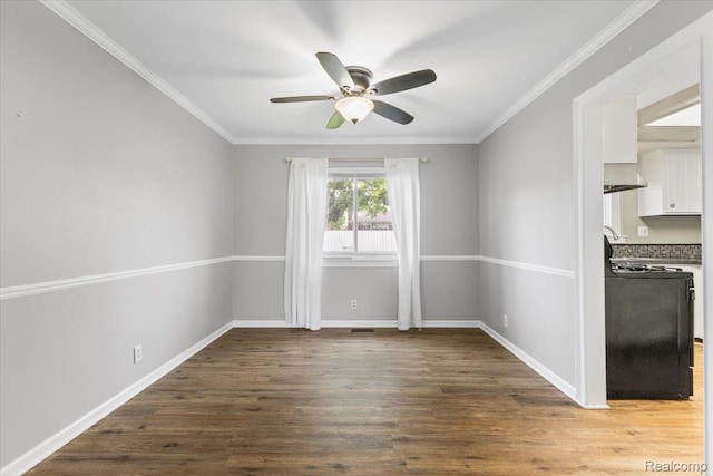 12360 Moers Dr, Sterling Heights, MI 48313 - empty room with a ceiling fan, wood finished floors, and ornamental molding
