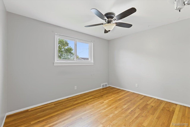 12360 Moers Dr, Sterling Heights, MI 48313 - unfurnished room with light wood-type flooring and ceiling fan