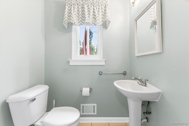 12360 Moers Dr, Sterling Heights, MI 48313 - bathroom with toilet and baseboards