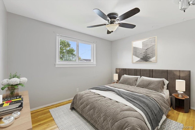 12360 Moers Dr, Sterling Heights, MI 48313 - bedroom featuring light wood finished floors and ceiling fan