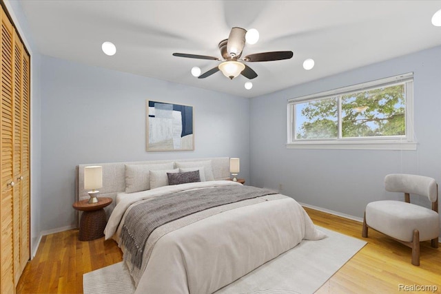 12360 Moers Dr, Sterling Heights, MI 48313 - bedroom featuring a closet, wood finished floors, and ceiling fan