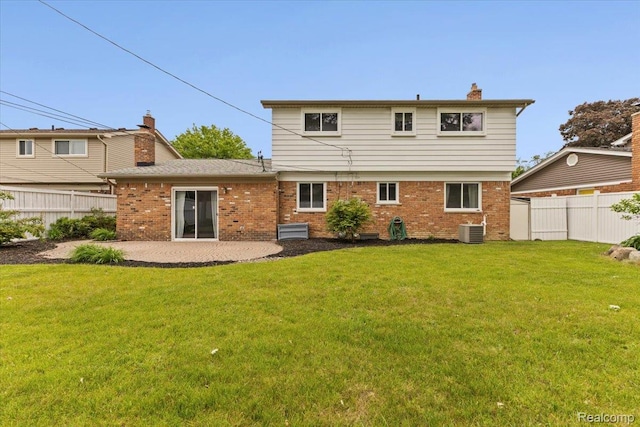 12360 Moers Dr, Sterling Heights, MI 48313 - rear view of house featuring brick siding, a fenced backyard, a chimney, and a patio