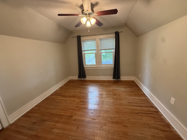 1316 Vassar Dr, Kalamazoo, MI 49001 - additional living space featuring lofted ceiling, a ceiling fan, and wood finished floors