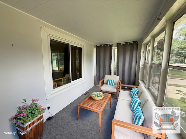 1316 Vassar Dr, Kalamazoo, MI 49001 - sunroom with carpet flooring and an outdoor living space