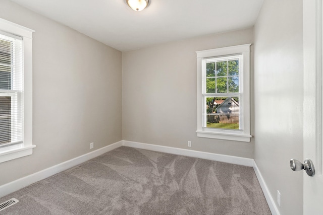 716 17th St, Jackson, MI 49203 - empty room with carpet and baseboards