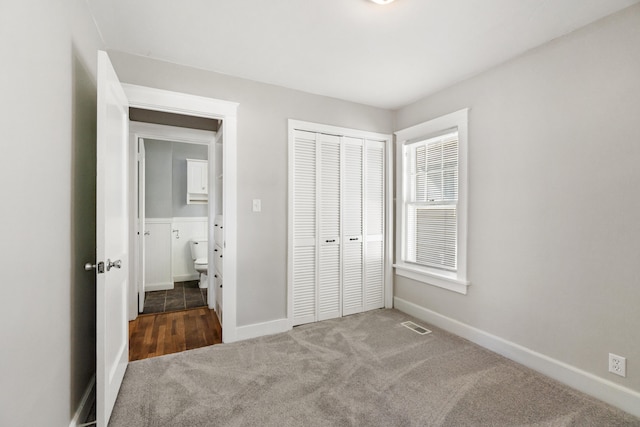 716 17th St, Jackson, MI 49203 - unfurnished bedroom featuring carpet floors and a closet