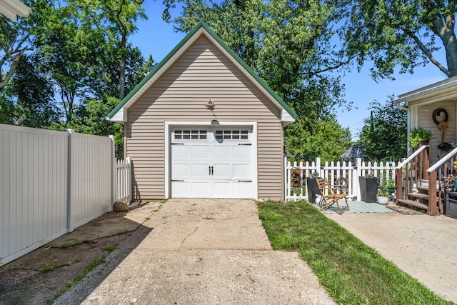 716 17th St, Jackson, MI 49203 - detached garage featuring concrete driveway