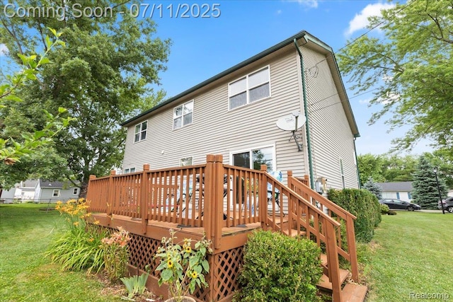 3070 10th St, Monroe, MI 48162 - back of property with a yard and a deck