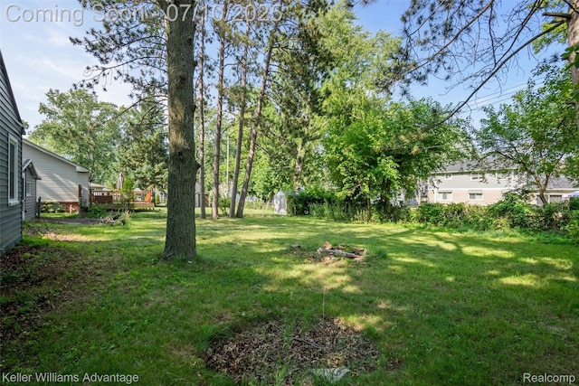 15326 Brookfield St, Livonia, MI 48154 - view of grassy yard with a deck