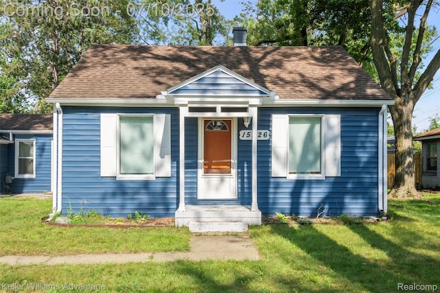 15326 Brookfield St, Livonia, MI 48154 - view of front of house with a front lawn and a shingled roof