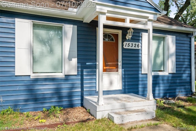 15326 Brookfield St, Livonia, MI 48154 - view of exterior entry featuring a shingled roof