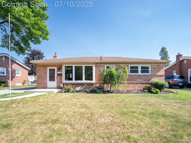 35622 Minton St, Livonia, MI 48150 - ranch-style home featuring brick siding, a chimney, and a front yard