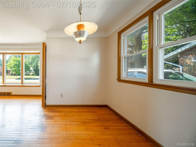 35622 Minton St, Livonia, MI 48150 - empty room with baseboards and light wood-style flooring