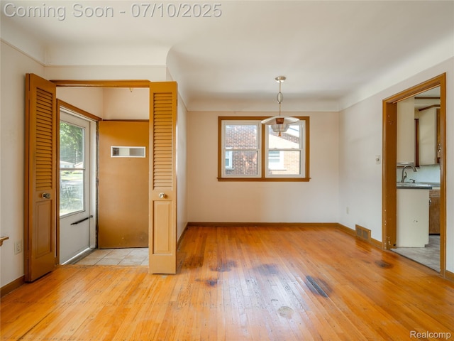 35622 Minton St, Livonia, MI 48150 - entrance foyer featuring healthy amount of natural light and light wood-style flooring