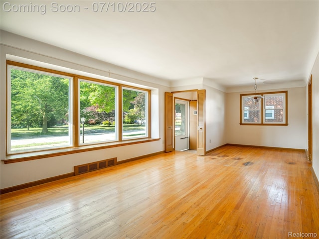 35622 Minton St, Livonia, MI 48150 - empty room featuring baseboards and light wood finished floors