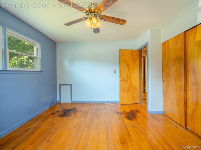 35622 Minton St, Livonia, MI 48150 - unfurnished bedroom featuring light wood-style flooring, a closet, and ceiling fan