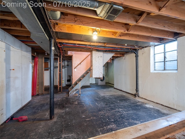 35622 Minton St, Livonia, MI 48150 - below grade area featuring stairs and water heater