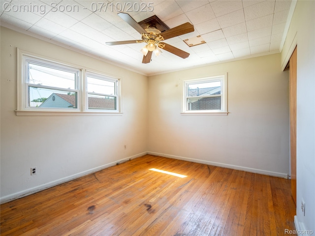 35622 Minton St, Livonia, MI 48150 - unfurnished room with plenty of natural light, hardwood / wood-style floors, and a ceiling fan
