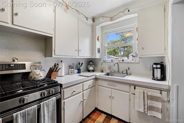28589 Everett St, Southfield, MI 48076 - kitchen with stainless steel range with gas stovetop, light countertops, and decorative backsplash