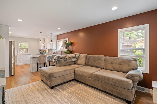 10637 Portage Rd, Portage, MI 49002 - living room with light wood-style flooring and recessed lighting